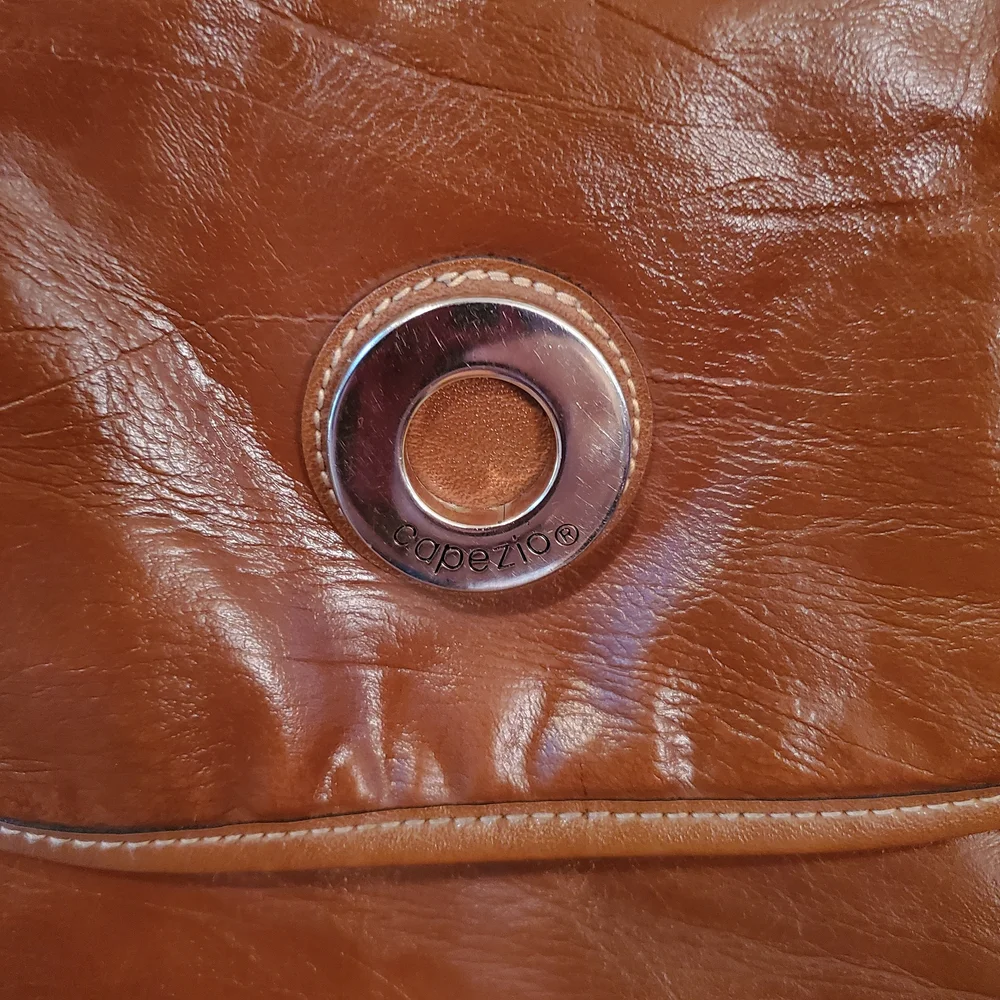 Vintage Capezio Cognac Bucket Crossbody Bag – Classic Gold Medallion